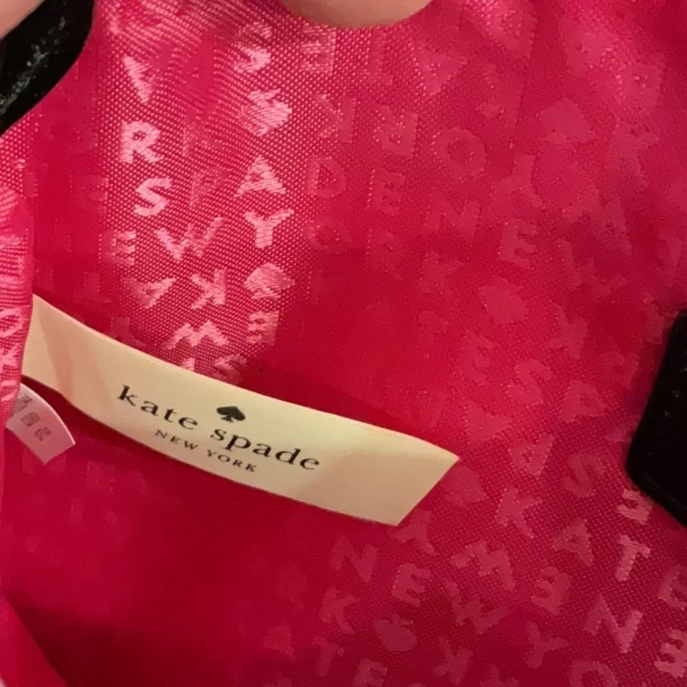 Kate Spade shiny black wristlet w/dots & logo spades